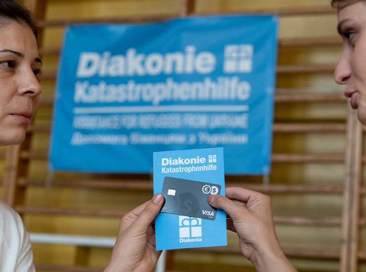 Vergabe von Debitkarten an Geflüchtete in Polen
