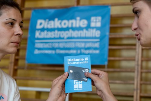 Vergabe von Debitkarten an Geflüchtete in Polen